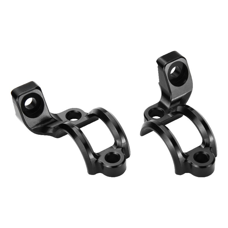 Two black metal brackets on a white background