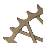 Close-up of a metallic gear on a white background