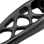 Close-up of a black, intricately designed metal component on a white background
